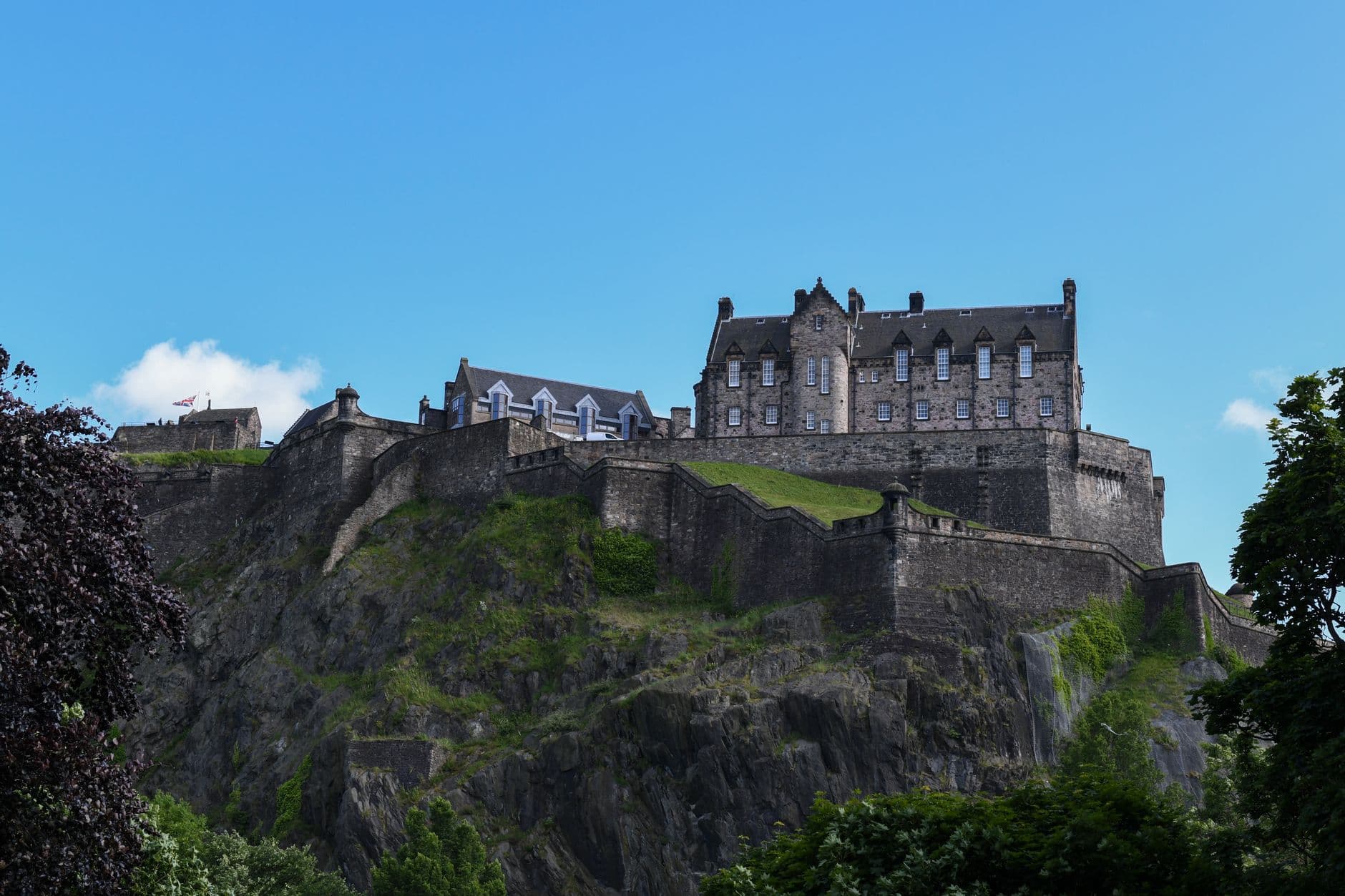Stunning view of Edinburgh Castle perched on Castle Rock, Scotland on a clear day.