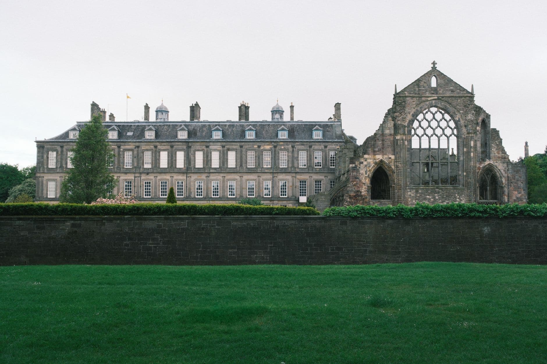 A historic palace with medieval ruins, showcasing classic architecture in Scotland.